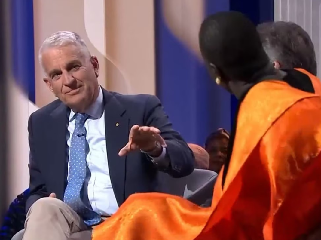 Former PM John Anderson and lawyer Nyadol Nyuon. Picture ABC_news.com.au