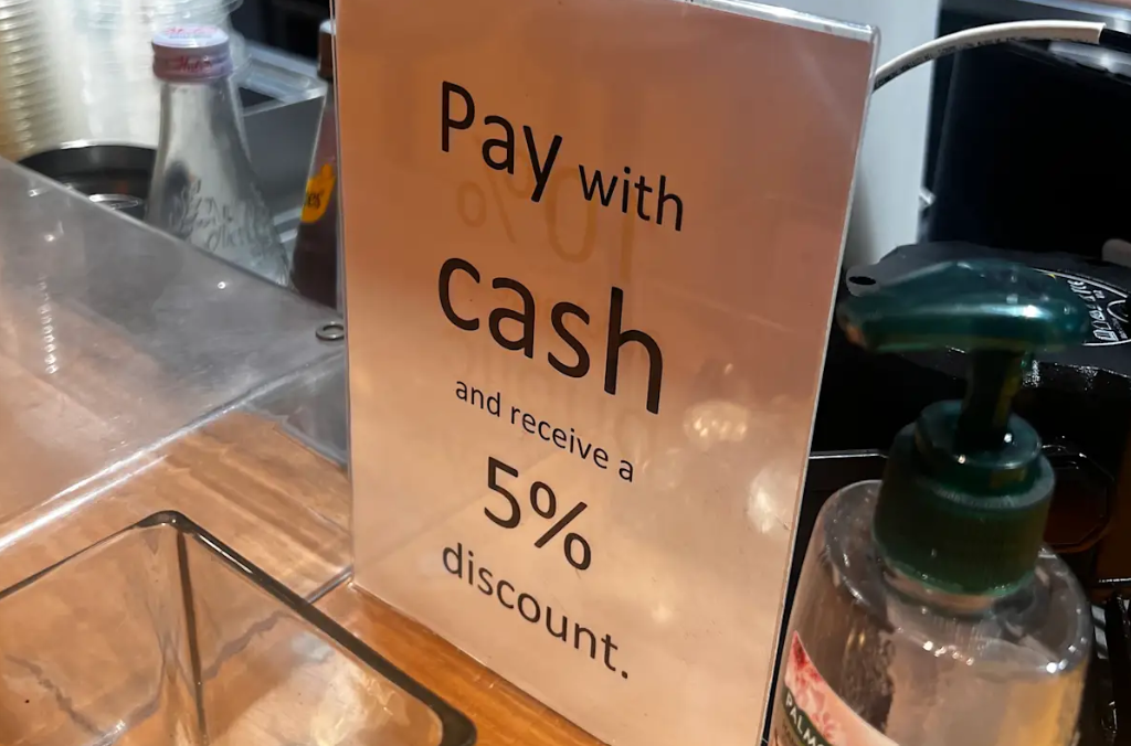 Since the credit card surcharge ban, hospitality venues have begun displaying signs offering discounts for cash. Pictured: Doodee King. Jo Abi Since the credit card surcharge ban, hospitality venues have begun displaying signs offering discounts for cash. Pictured: Doodee King. Jo Abi